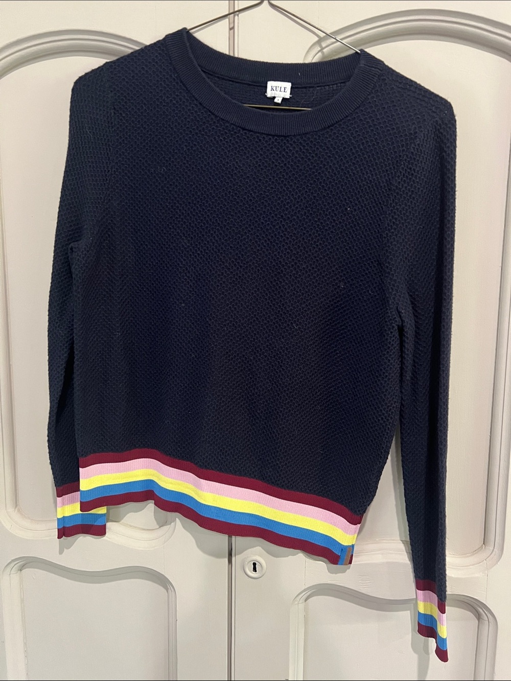 KULE Navy Crewneck Sweater with Rainbow Hem